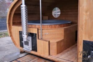 Outdoor oval sauna with an integrated hot tub (46)