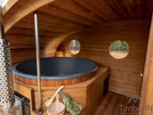 Outdoor oval sauna with an integrated hot tub (79)