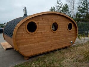 Outdoor oval sauna with an integrated hot tub (80)